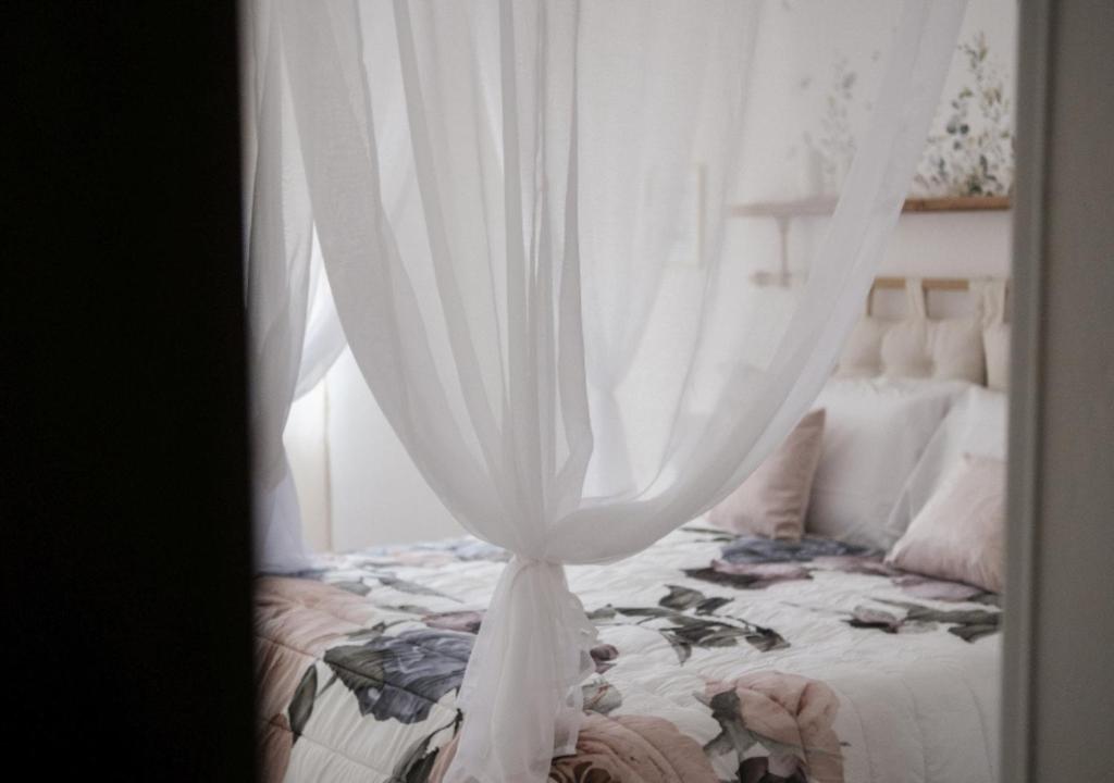 Postel nebo postele na pokoji v ubytování Casa di Endimione