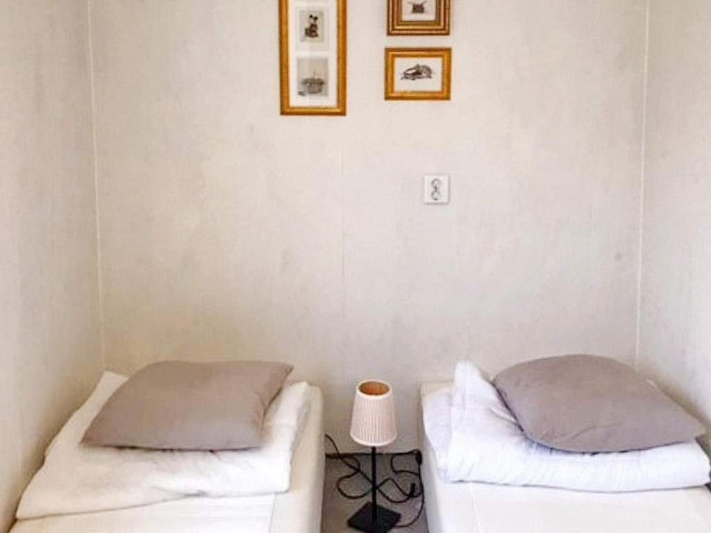 Postel nebo postele na pokoji v ubytování Holiday home Sölvesborg XII