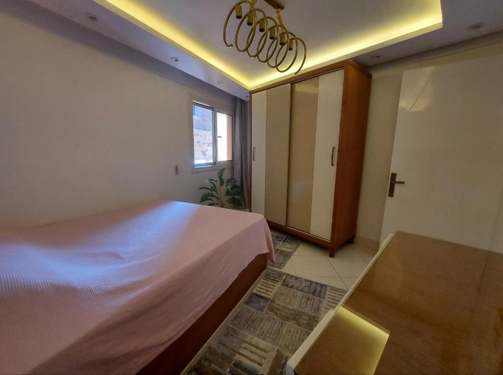 Postel nebo postele na pokoji v ubytování Alexandria Seaview studio