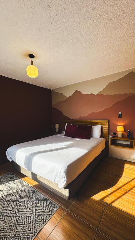 Postel nebo postele na pokoji v ubytování Hotel Agave Baños