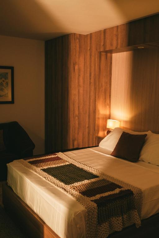 Postel nebo postele na pokoji v ubytování drb Suites