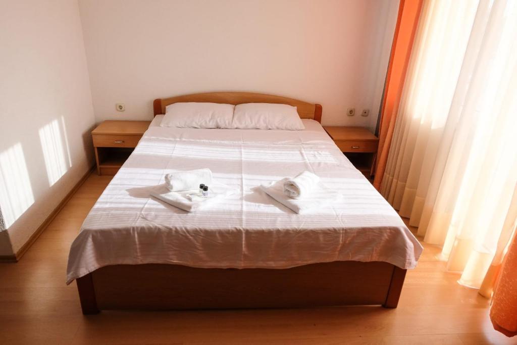 Postel nebo postele na pokoji v ubytování Hotel ARISTON