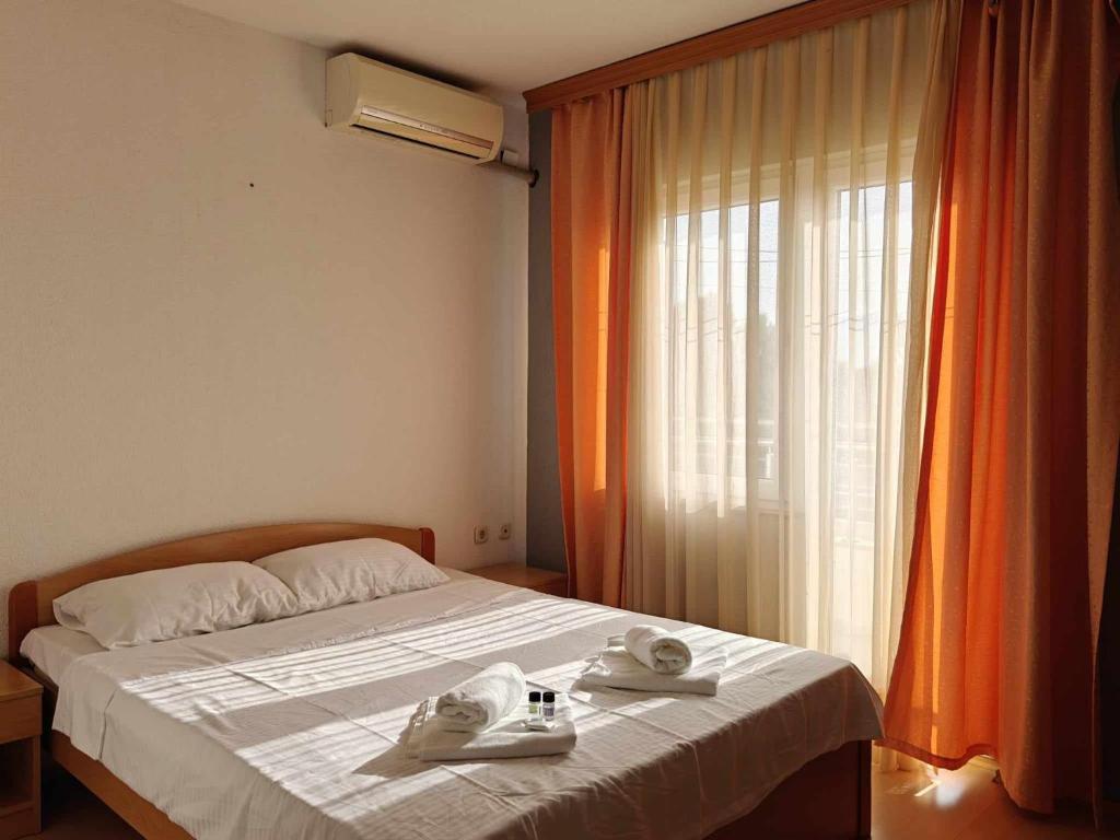 Postel nebo postele na pokoji v ubytování Hotel ARISTON