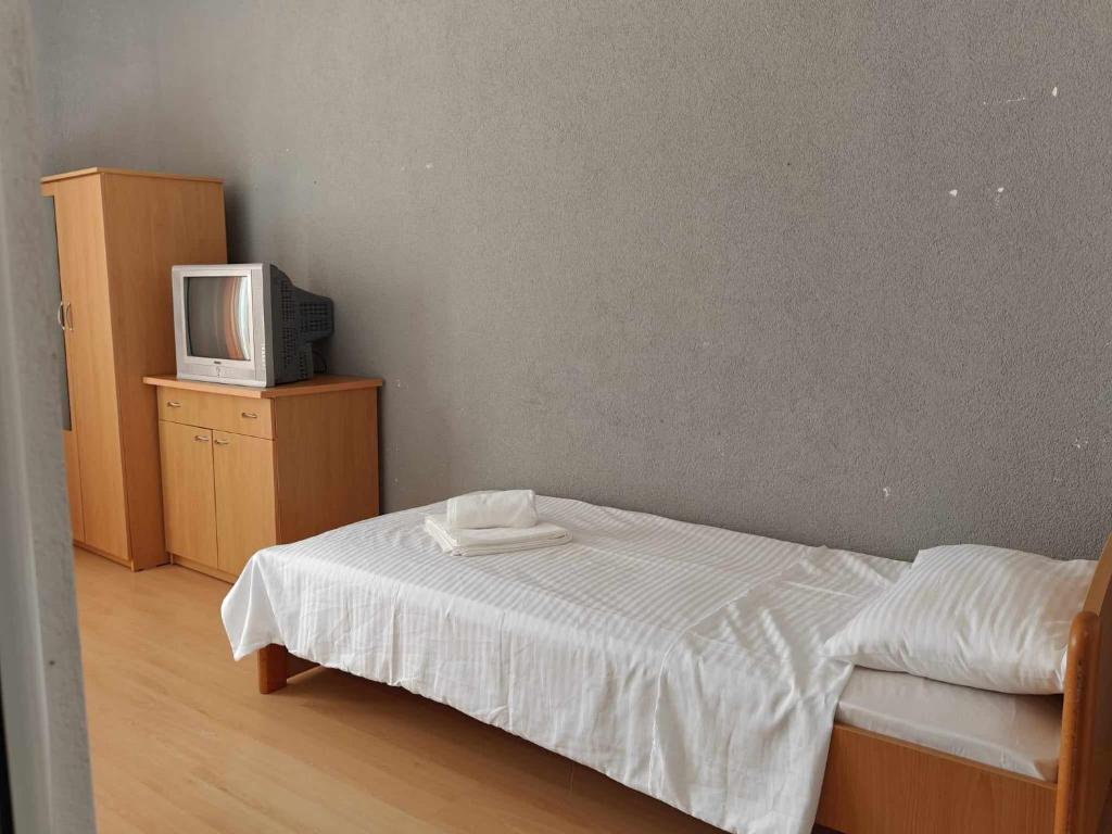 Postel nebo postele na pokoji v ubytování Hotel ARISTON