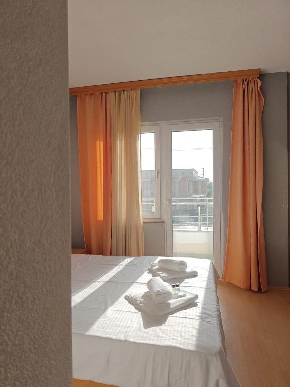 Postel nebo postele na pokoji v ubytování Hotel ARISTON