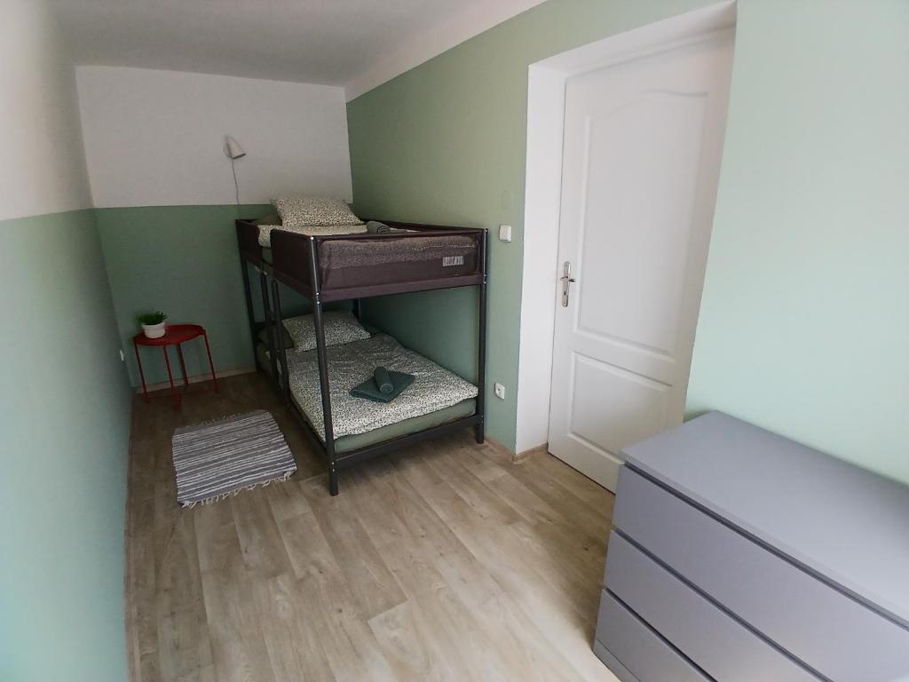 Postel nebo postele na pokoji v ubytování Dům Krčín