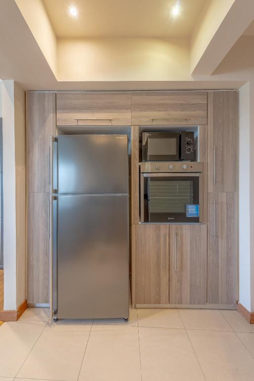 Kuchyň nebo kuchyňský kout v ubytování Maadi Stylish modern apartment 7