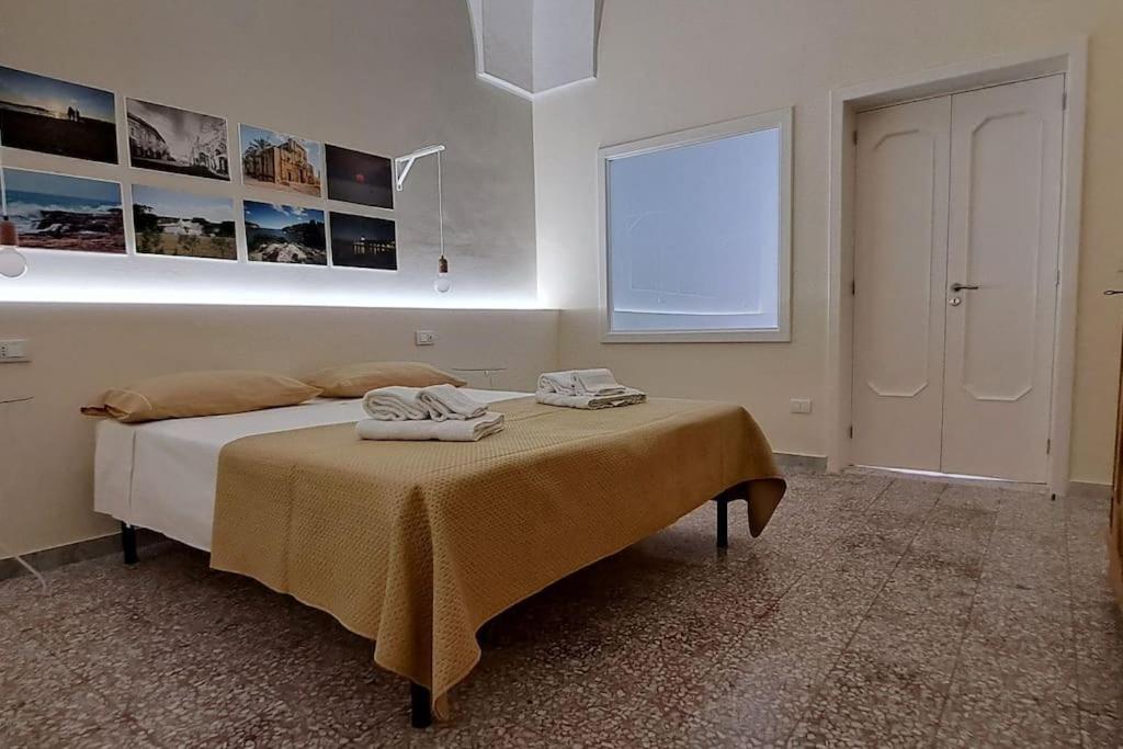 Postel nebo postele na pokoji v ubytování Casa Vacanze CHome