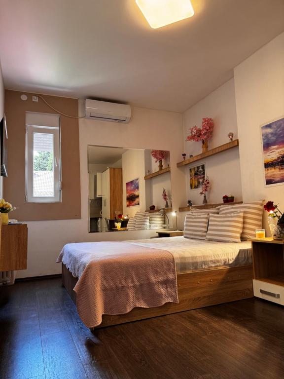 Postel nebo postele na pokoji v ubytování Post apartmani A-1