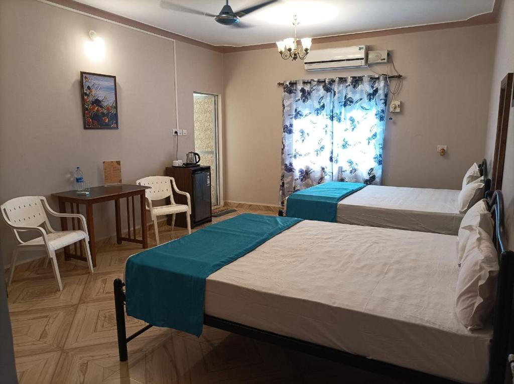 Postel nebo postele na pokoji v ubytování Bens Inn
