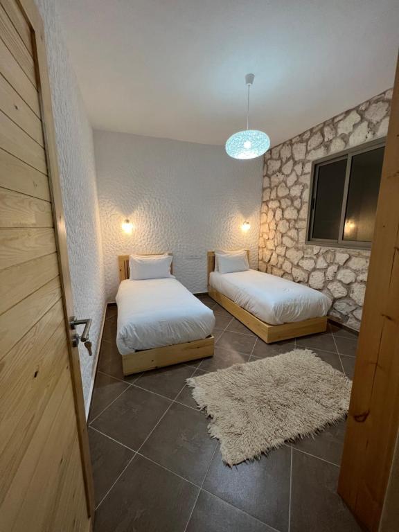 Postel nebo postele na pokoji v ubytování Le Réel Kaouki