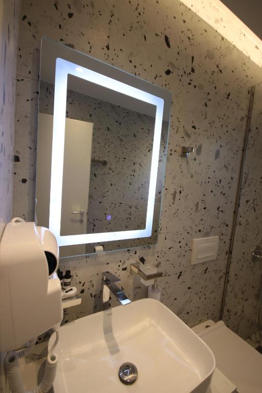 Koupelna v ubytování W Cika Hotel