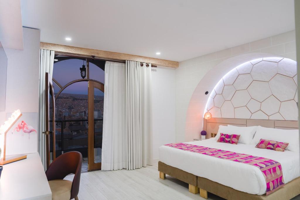 Illampu Art Boutique Hotelにあるベッド