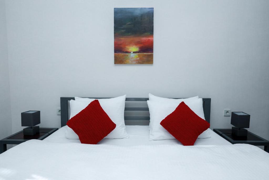 Postel nebo postele na pokoji v ubytování Syune Mini Hotel