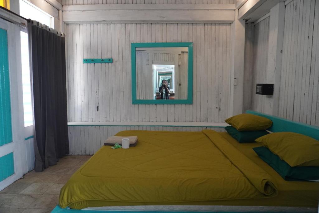 Postel nebo postele na pokoji v ubytování Kushak bungalow Gili Trawangan
