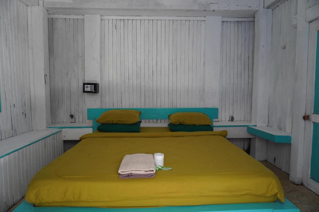 Postel nebo postele na pokoji v ubytování Kushak bungalow Gili Trawangan