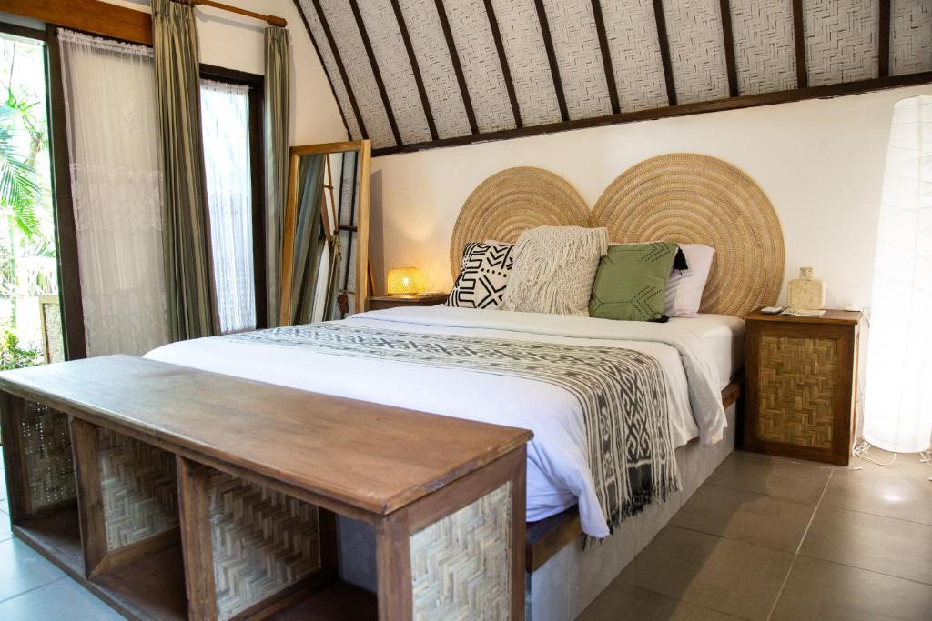 Postel nebo postele na pokoji v ubytování VILLA BAGUS - adults only hideaway
