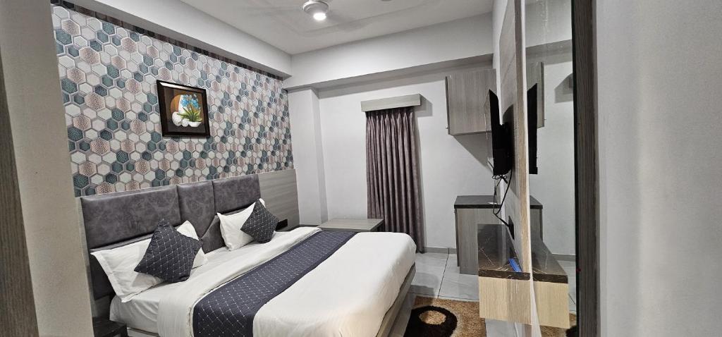 Postel nebo postele na pokoji v ubytování Hotel allen