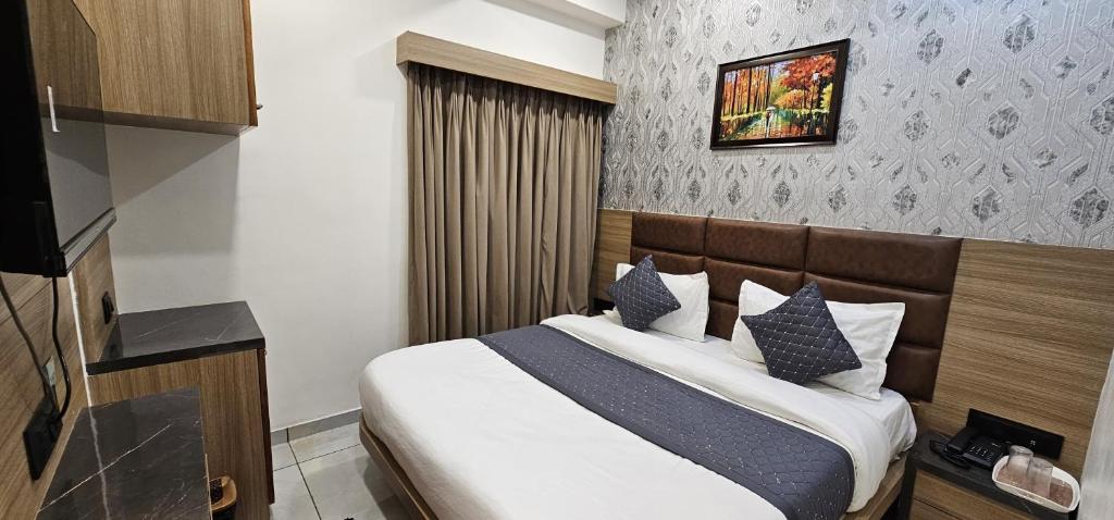 Postel nebo postele na pokoji v ubytování Hotel allen
