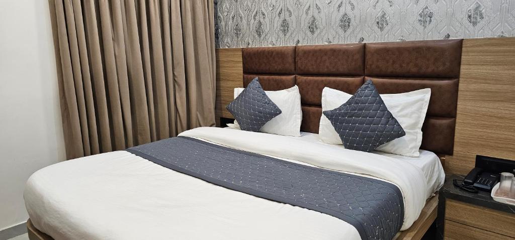 Postel nebo postele na pokoji v ubytování Hotel allen