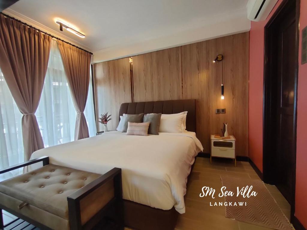 Postel nebo postele na pokoji v ubytování SM Sea Villa by Langkawi Lagoon Resort