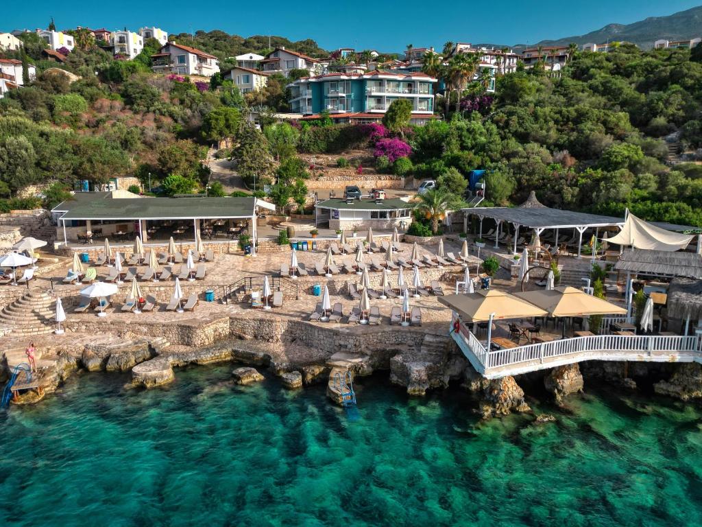 an aerial view of a resort on the water at Aquarius Hotel in Kaş