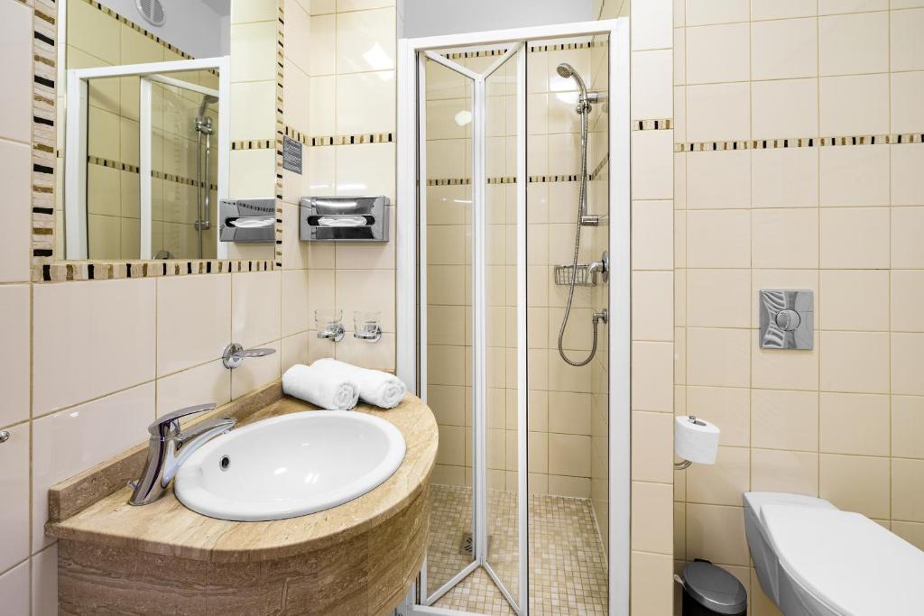 Koupelna v ubytování Wellness Hotel Astra