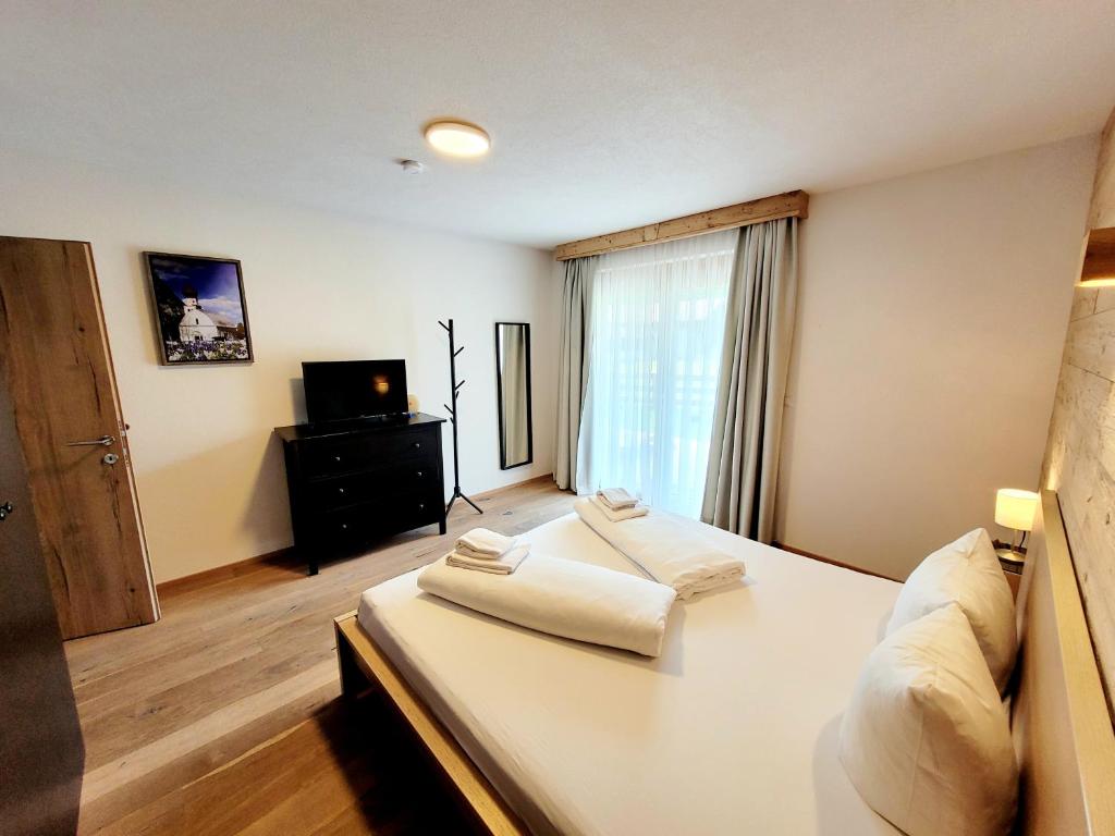 Posteľ alebo postele v izbe v ubytovaní Alpenchalet im Leutaschtal