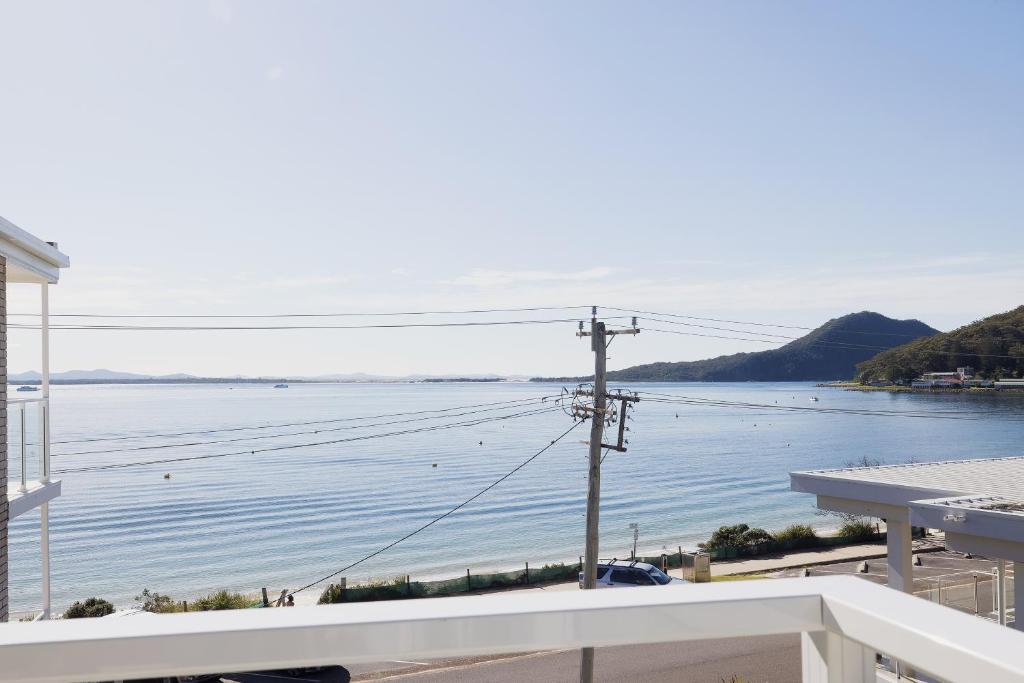 a view of a large body of water from a building at 6 Shoal Edge in Shoal Bay