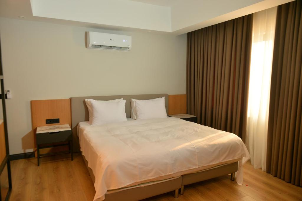 Postel nebo postele na pokoji v ubytování Miarosa Kemer Beach