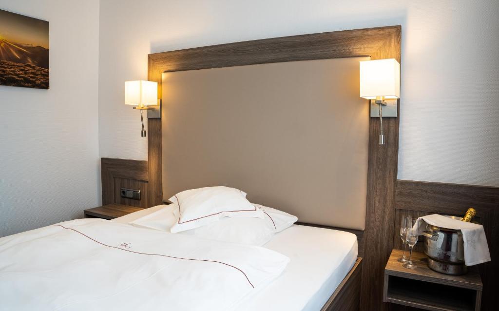 Postel nebo postele na pokoji v ubytování Landhaus Alpinia