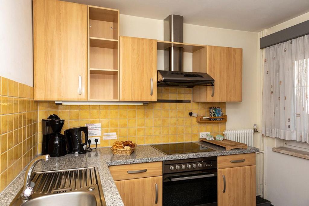 Kuchyň nebo kuchyňský kout v ubytování Haus Rosemarie