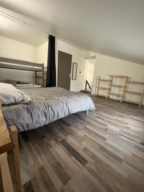Postel nebo postele na pokoji v ubytování Gîte1 pour 6 personnes
