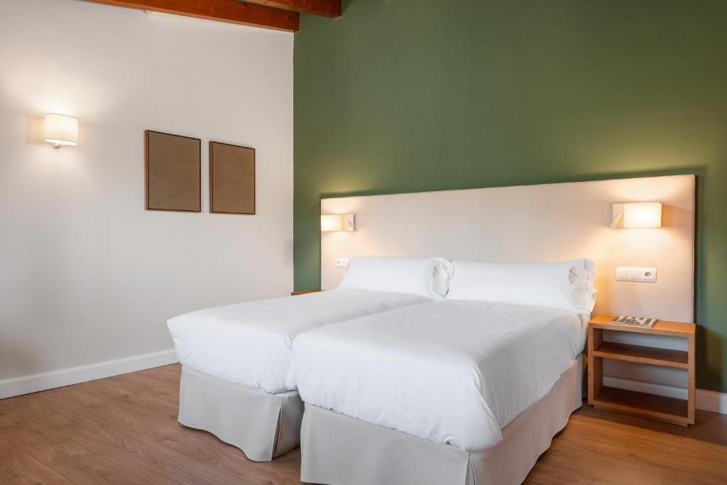 Postel nebo postele na pokoji v ubytování Can Xim-Turismo de Interior