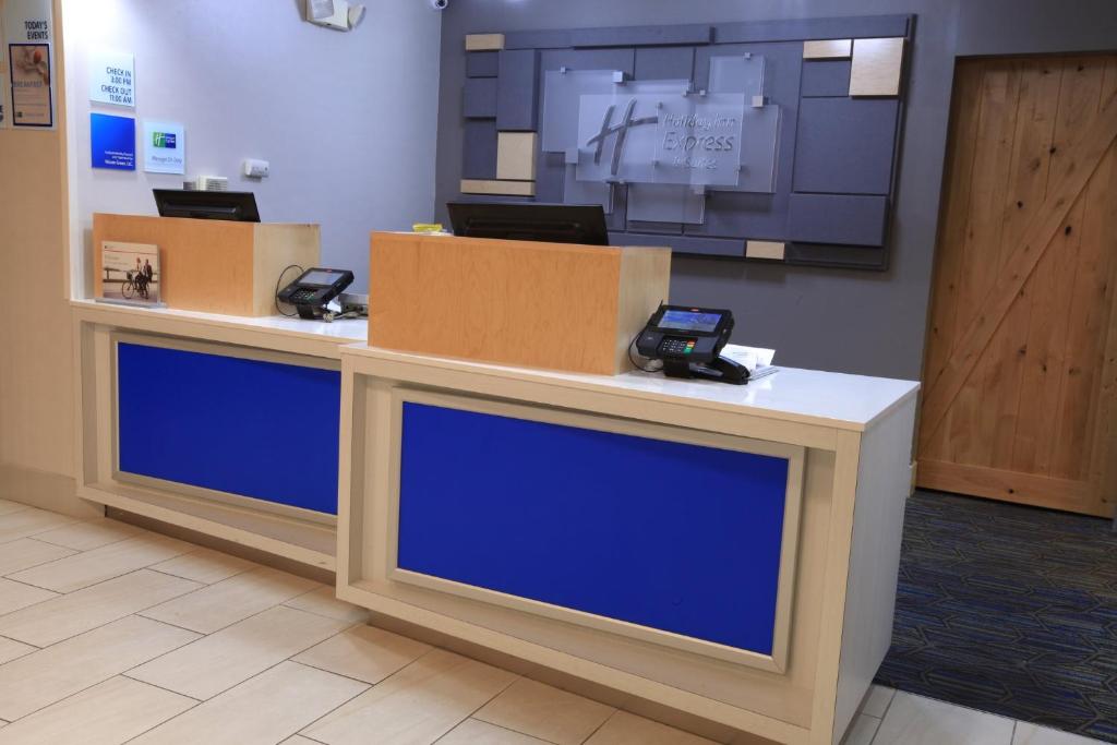 a counter in a store with boxes on it at Holiday Inn Express & Suites Chattanooga-Hixson by IHG in Hixson