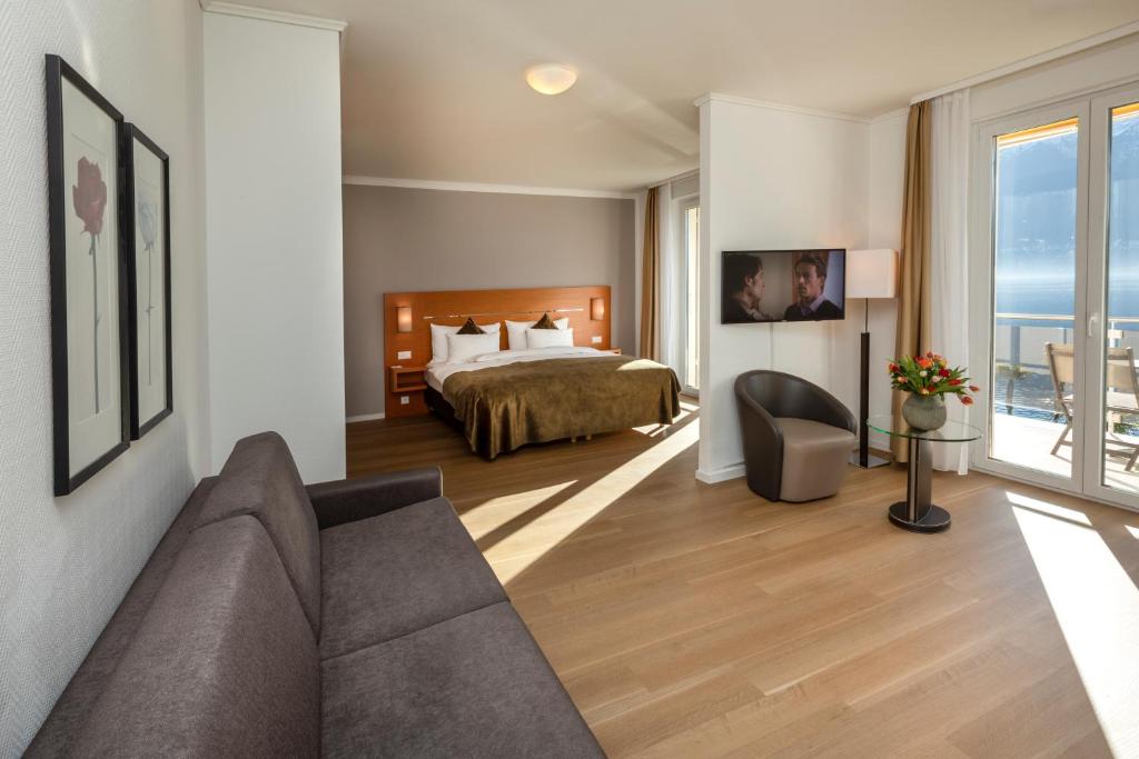 Postel nebo postele na pokoji v ubytování Hotel la Palma au Lac