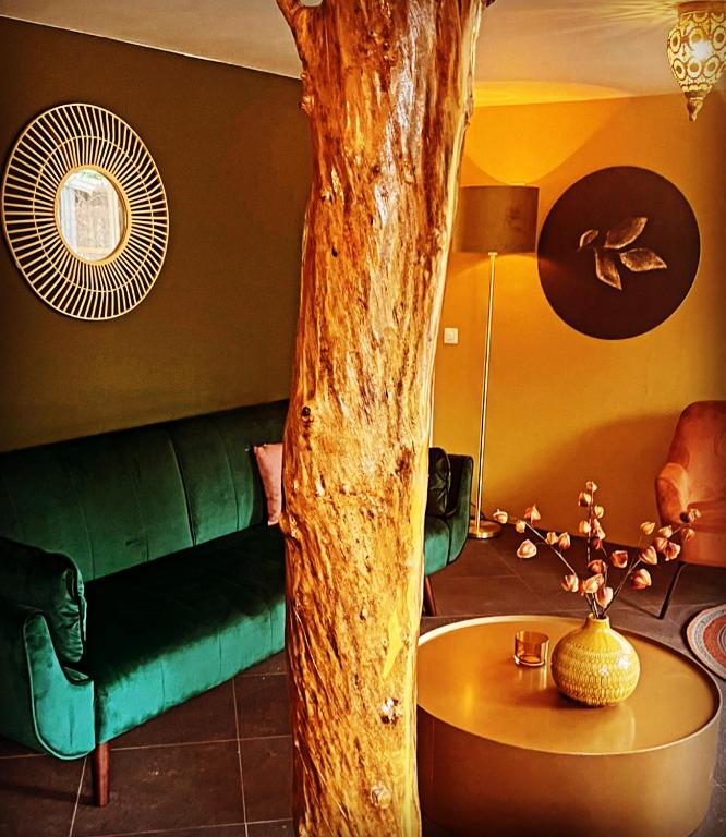 Posezení v ubytování Bungalow AMNIS by Sonnevijver Residences