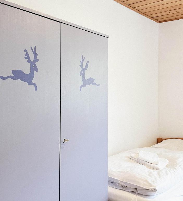 Postel nebo postele na pokoji v ubytování s´Amagmach