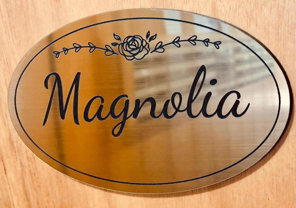 Certifikát, hodnocení, plakát nebo jiný dokument vystavený v ubytování Magnolia