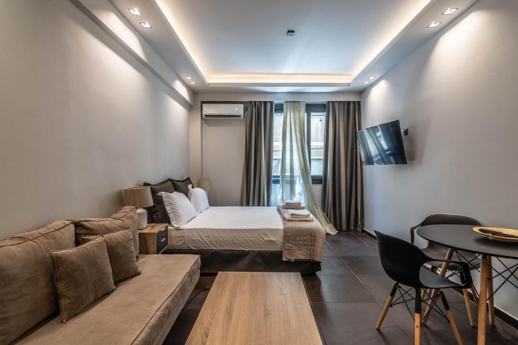TV a/nebo společenská místnost v ubytování Furla Apartments Athens