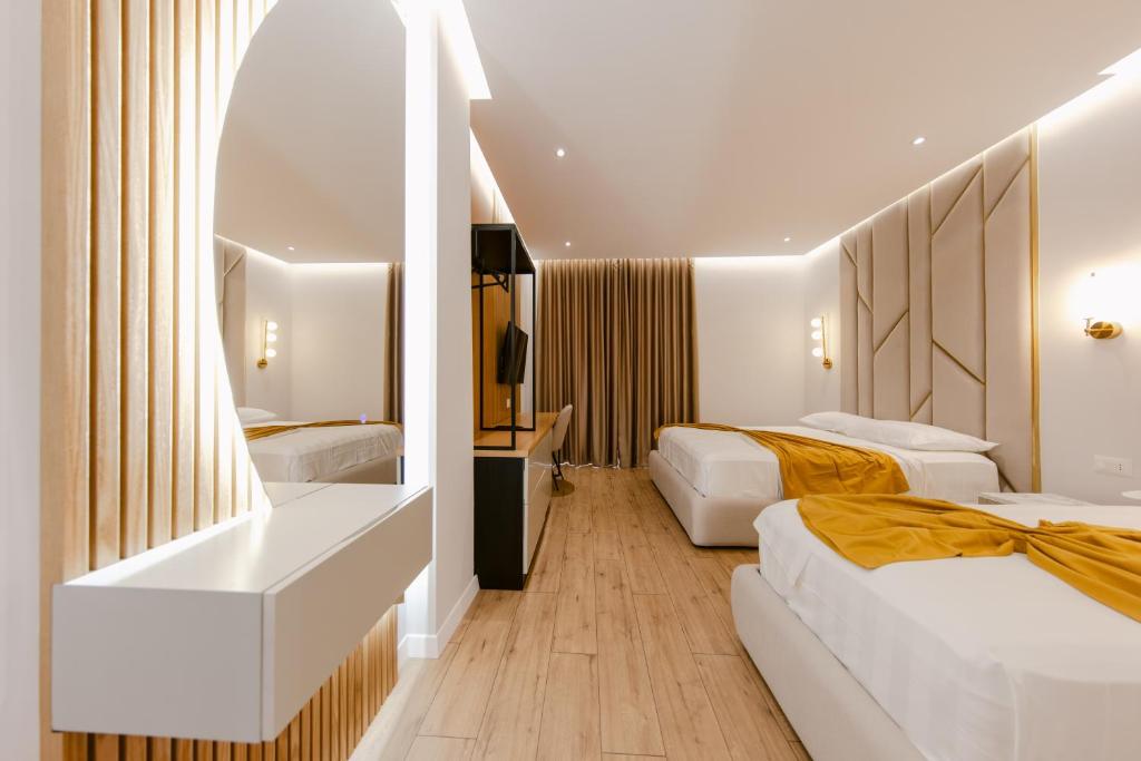 Postel nebo postele na pokoji v ubytování Hotel Olsi