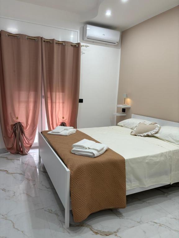 Postel nebo postele na pokoji v ubytování B&B A un passo dal mare