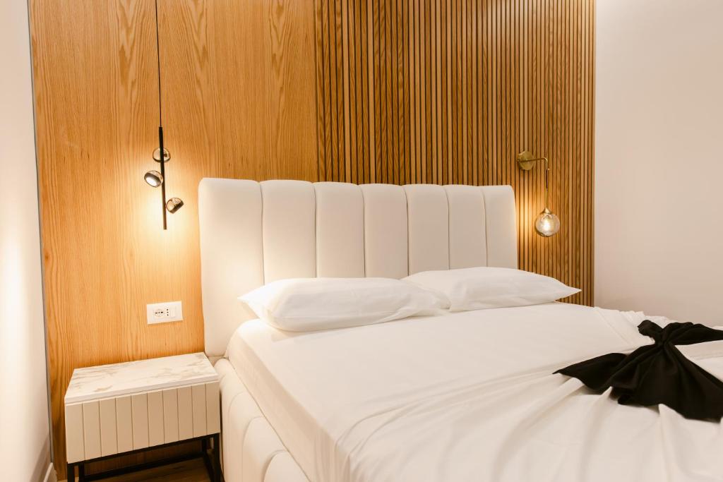 Postel nebo postele na pokoji v ubytování Hotel Olsi