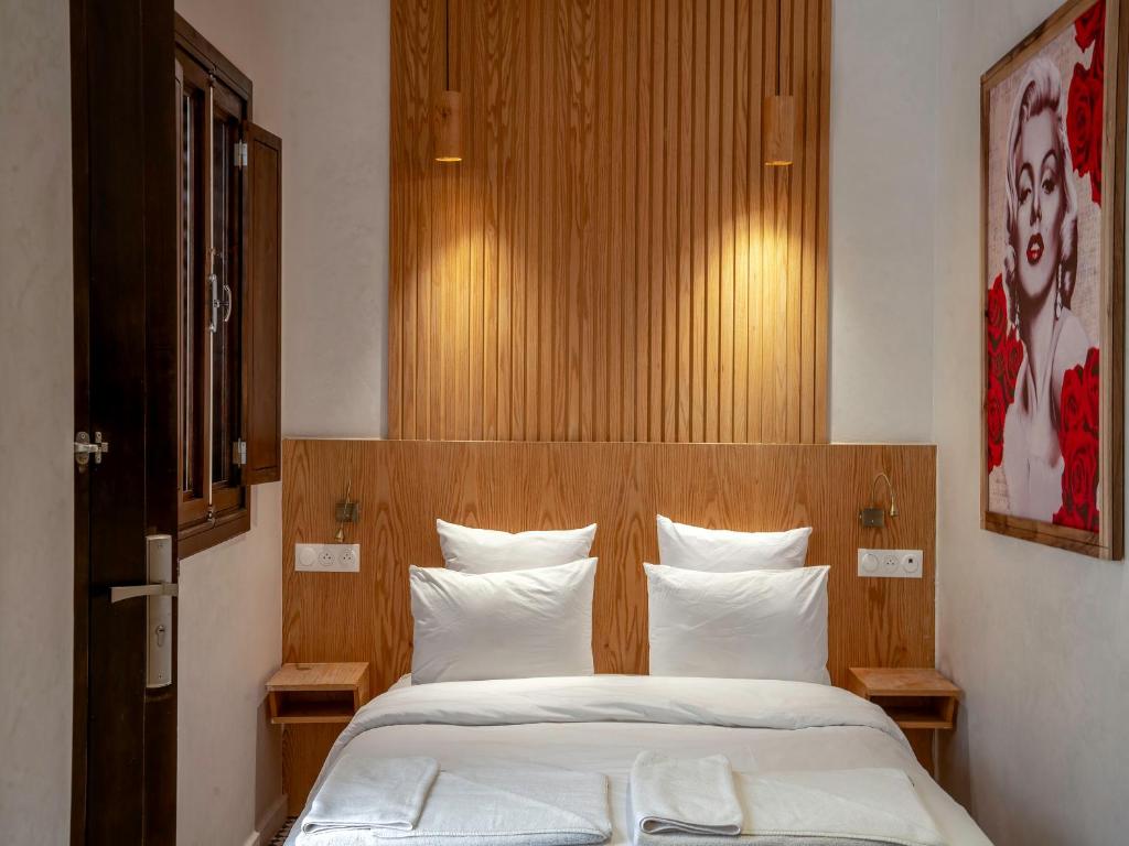 Postel nebo postele na pokoji v ubytování MAISON SOLANEOS