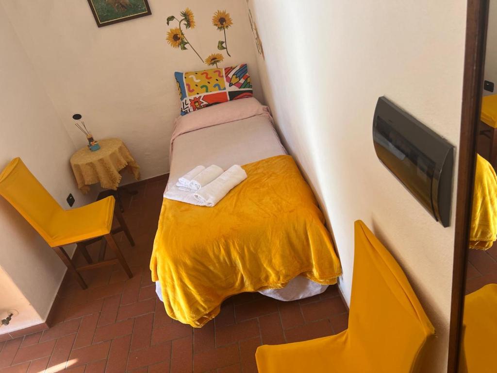Łóżko lub łóżka w pokoju w obiekcie Agriturismo La Castellina