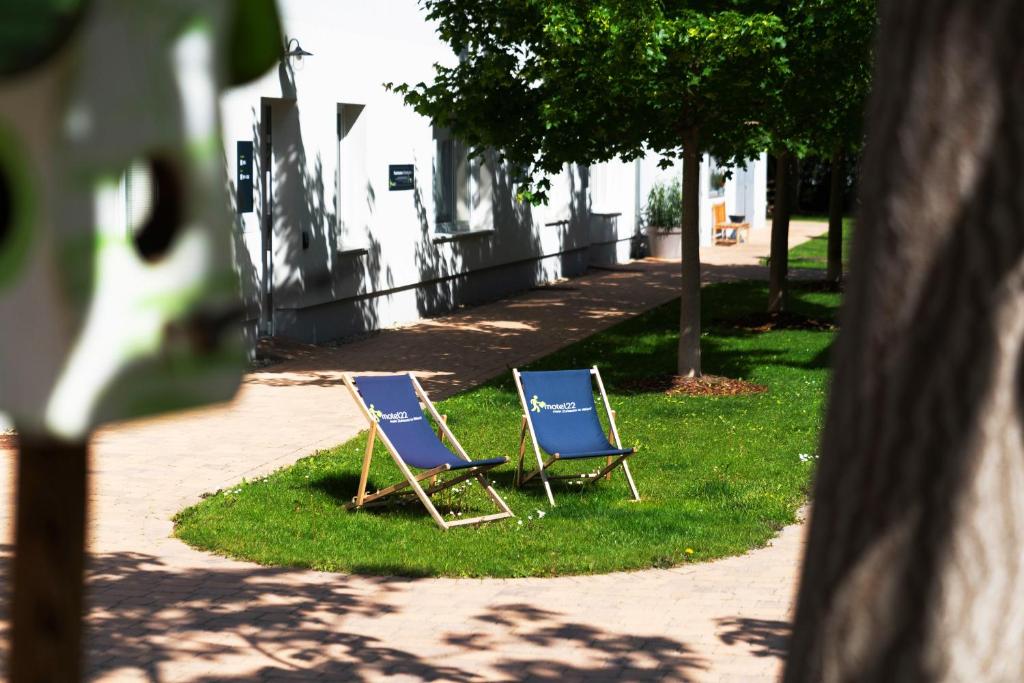 Vonkajšia záhrada v ubytovaní motel22 Parkplatz inklusive