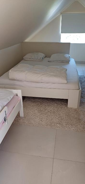 Postel nebo postele na pokoji v ubytování Thibault1