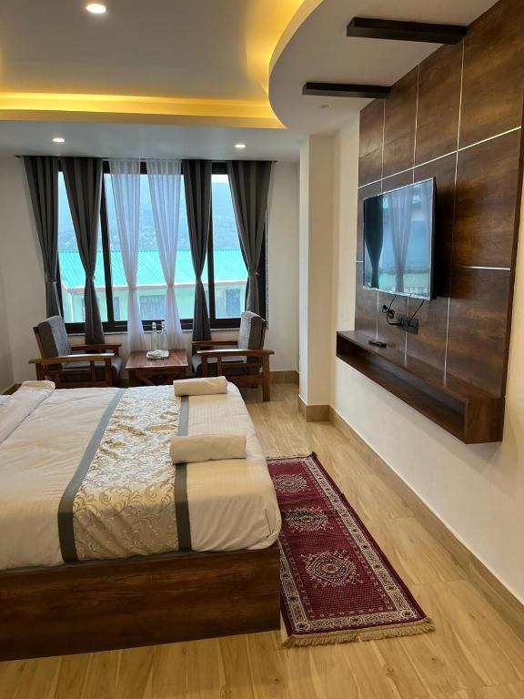 Postel nebo postele na pokoji v ubytování hotel sikkimlegend