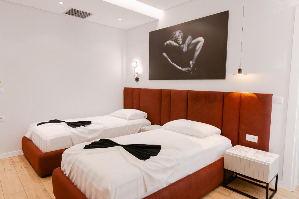 Postel nebo postele na pokoji v ubytování Hotel Olsi