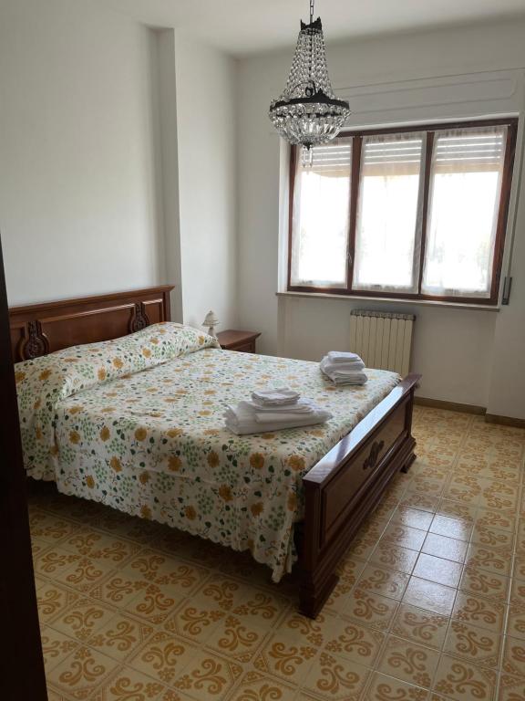 Postel nebo postele na pokoji v ubytování B&B Del Porto